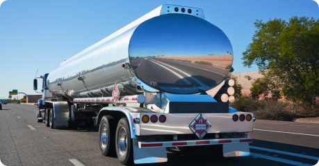 Fuel tanker pulling chrome colored fuel tank